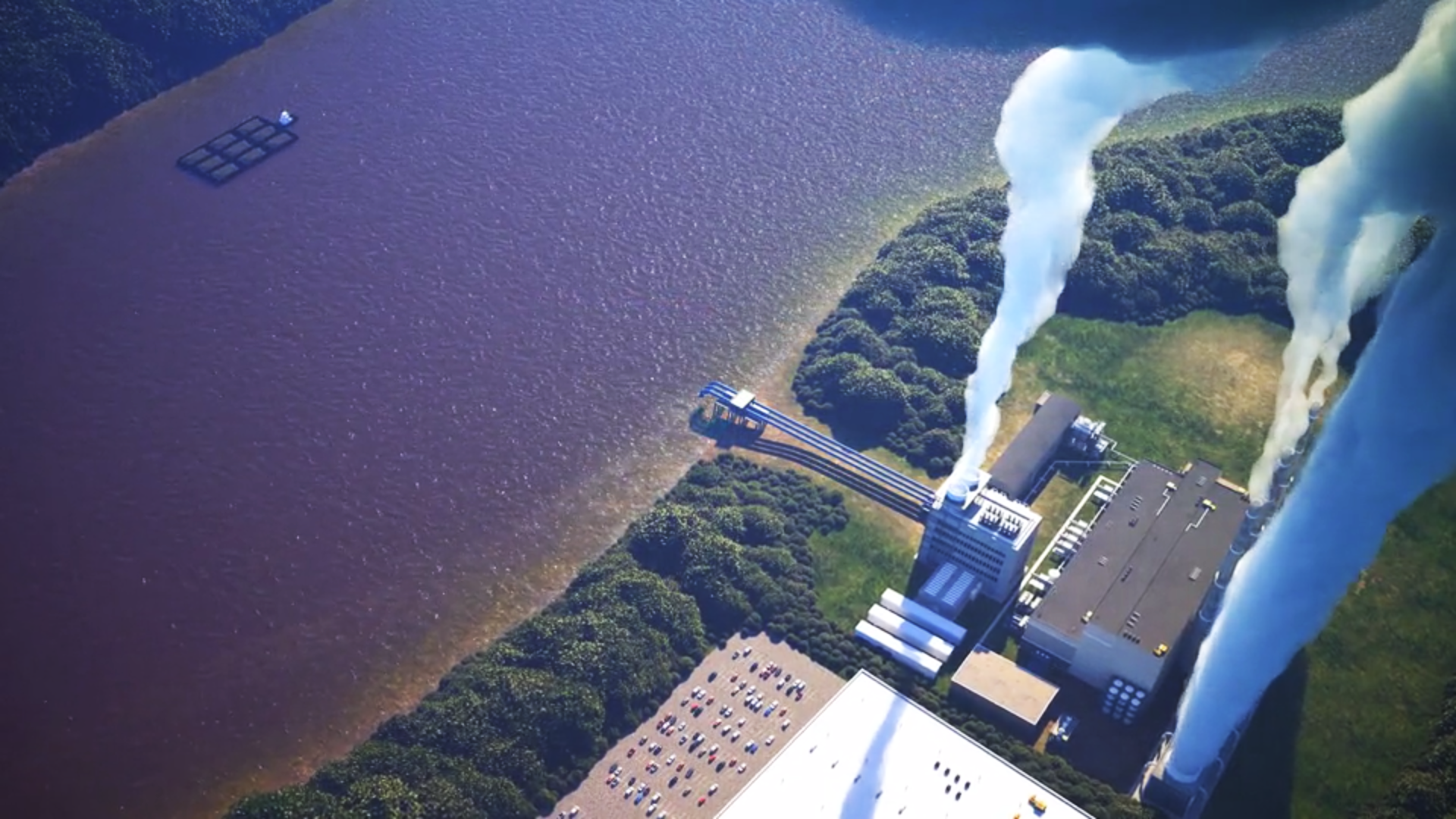This is a still image from a PR movie showing a birds eye view looking down at the Ohio river, featuring buildings emitting smoke in the lower right hand corner.