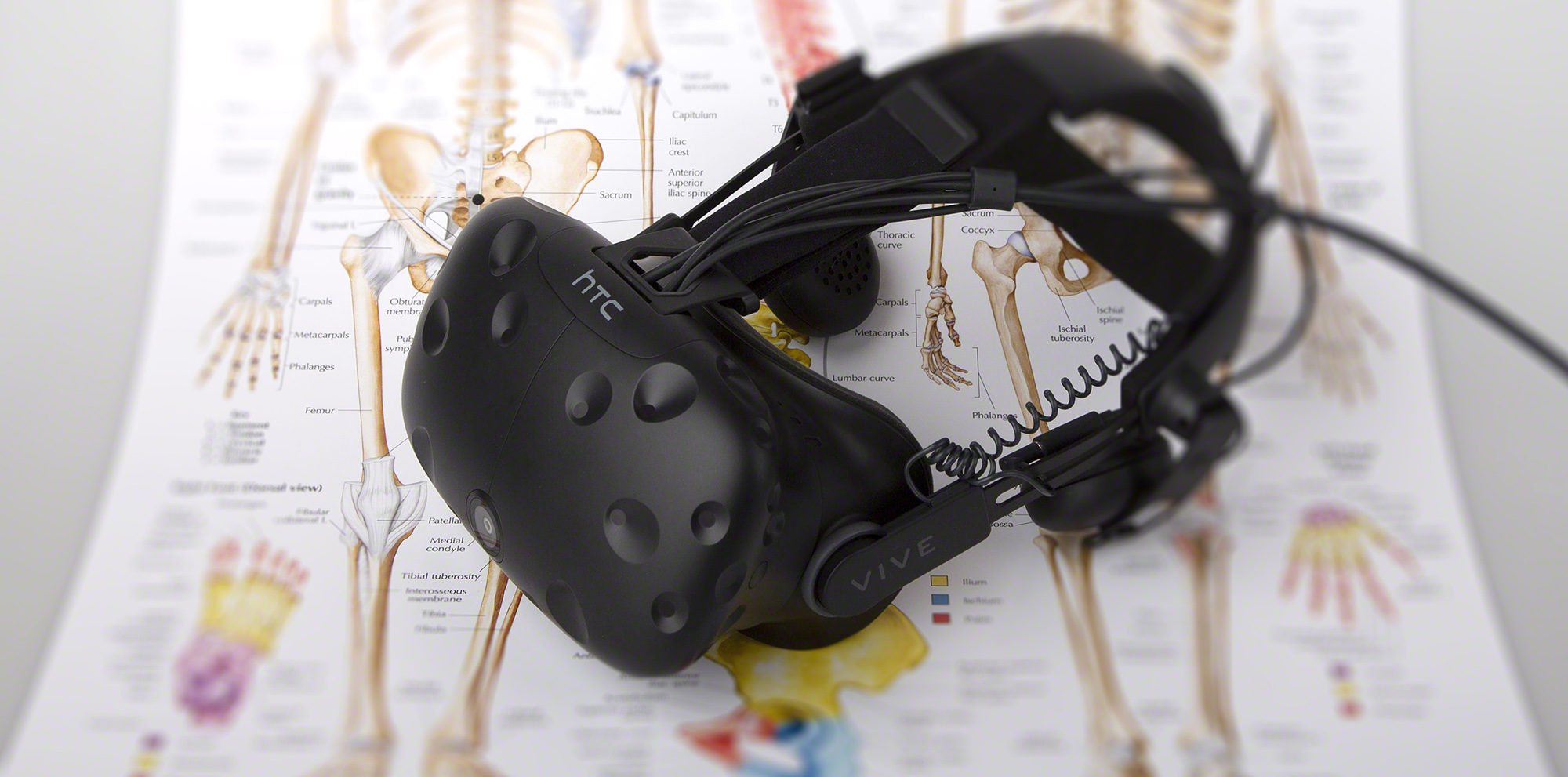 VR headset sitting on top of a medical illustration